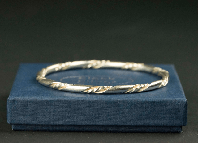 Silver "Twist within a Twist" Bangle