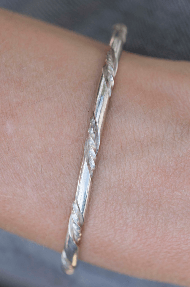 Silver "Twist within a Twist" Bangle