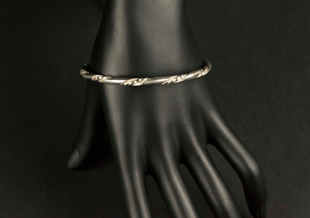 Silver "Twist within a Twist" Bangle